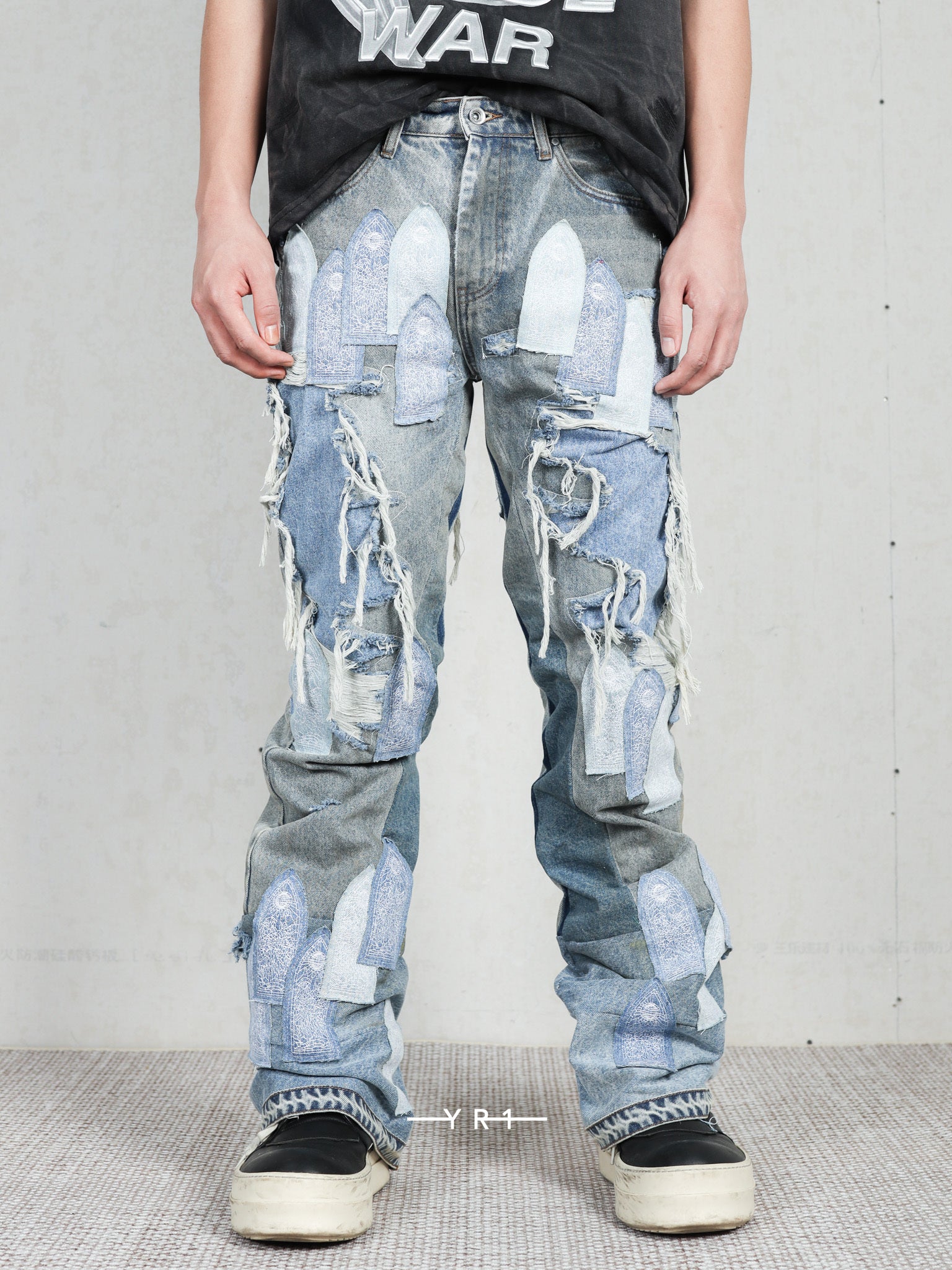 Patched Arch Repaired Blowout Denim WHO DECIDES WAR
