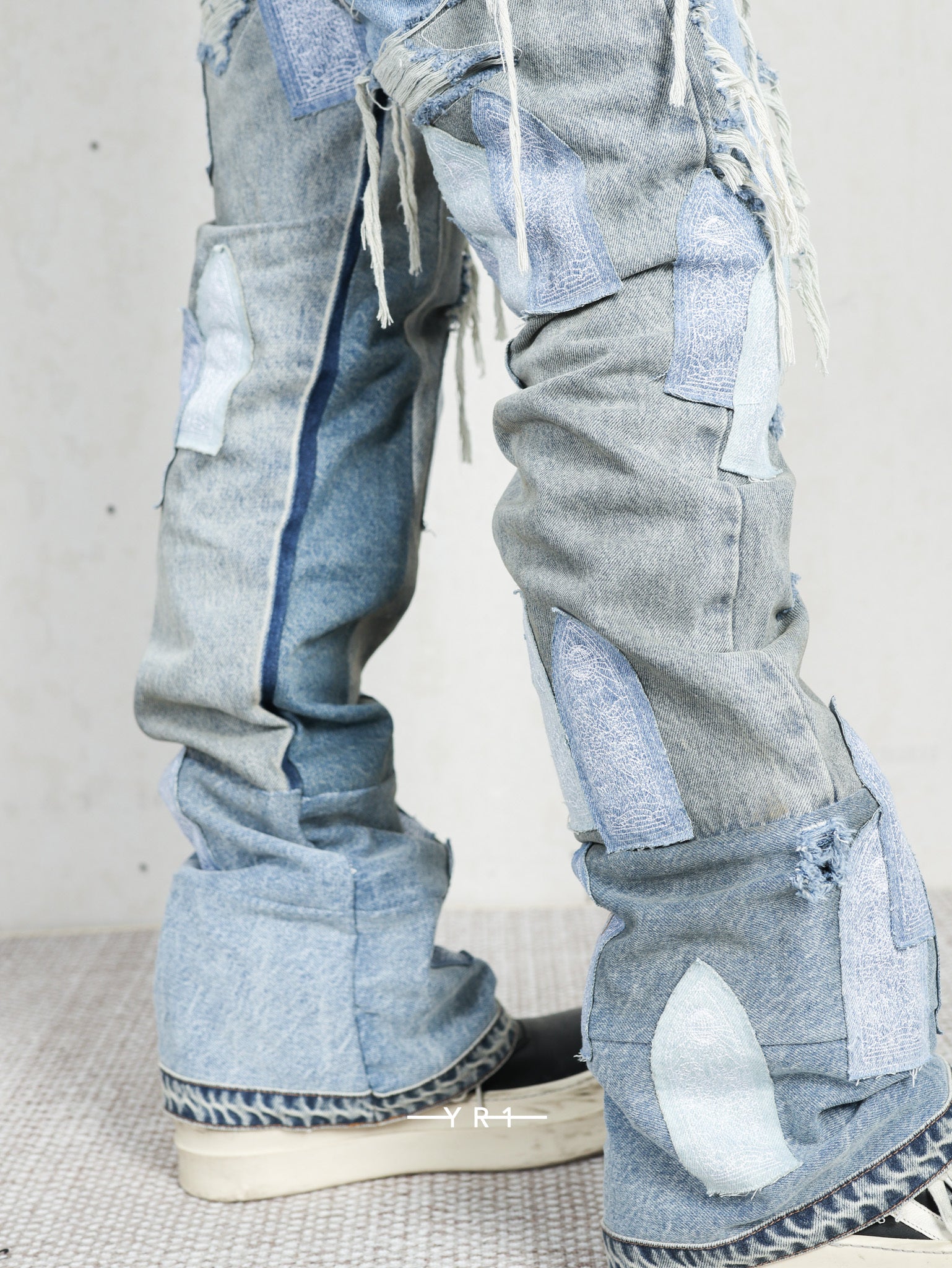 Patched Arch Repaired Blowout Denim WHO DECIDES WAR