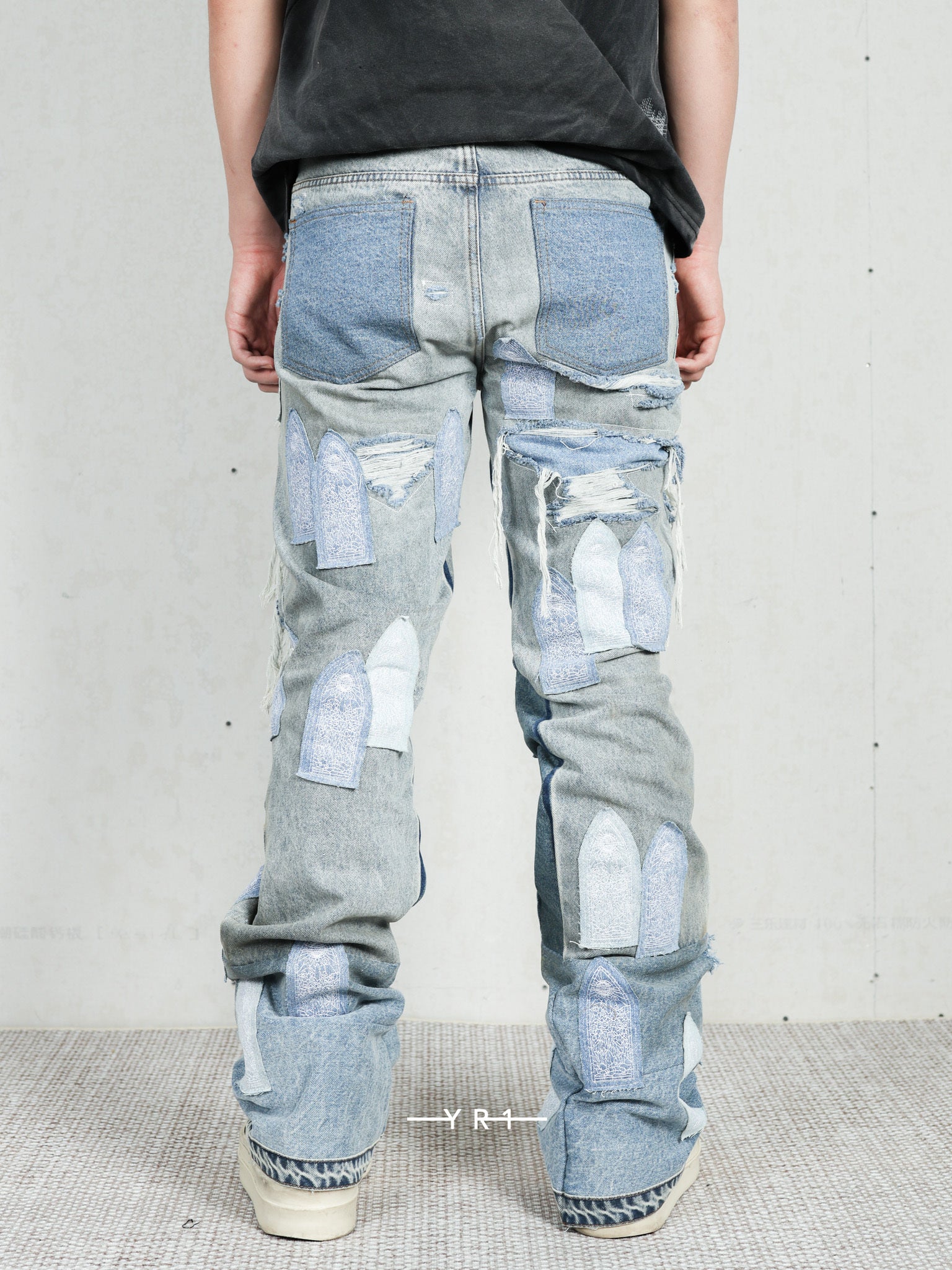 Patched Arch Repaired Blowout Denim WHO DECIDES WAR